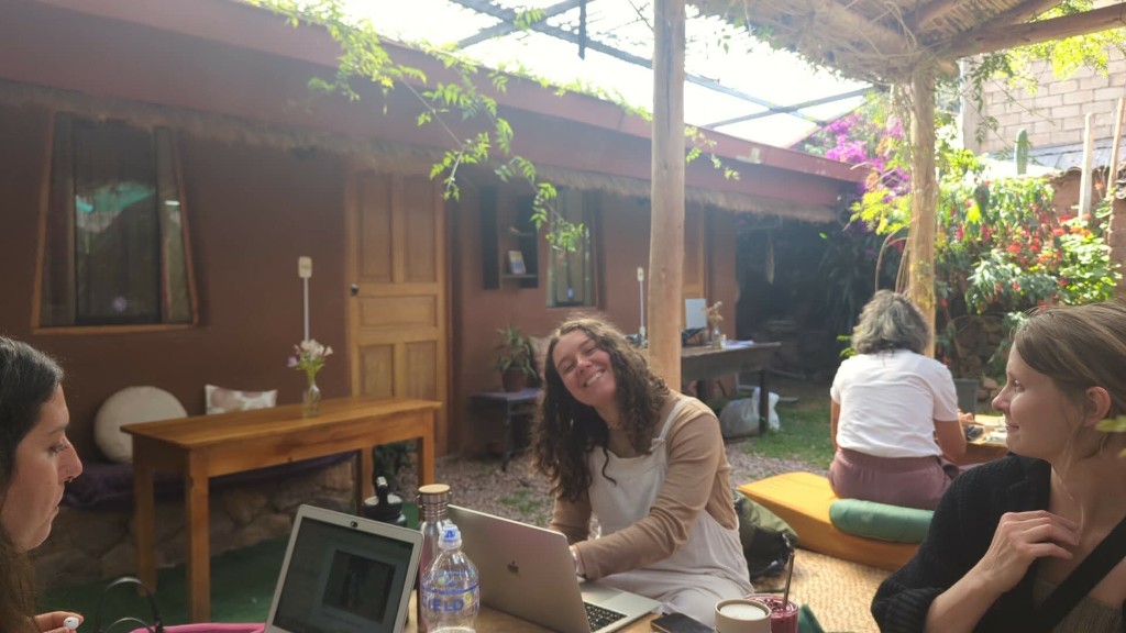 Coworking with friends at a café in Peru
